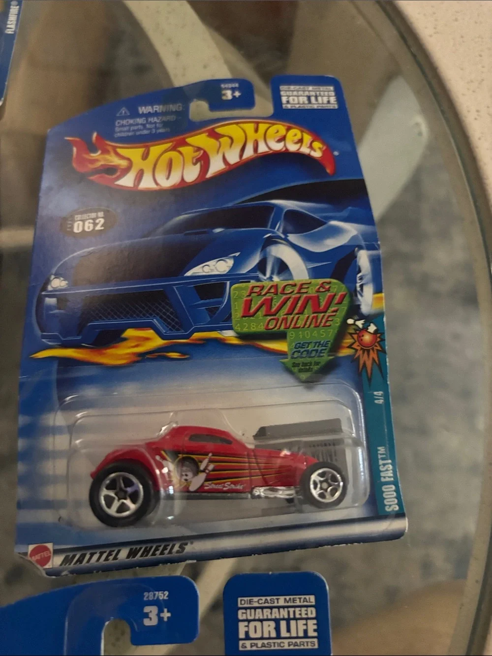 10 Hot Wheels cars in packaging